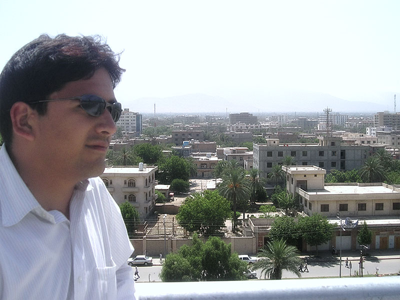 Obaid Mahmoodi with Afghanistan skyline in background