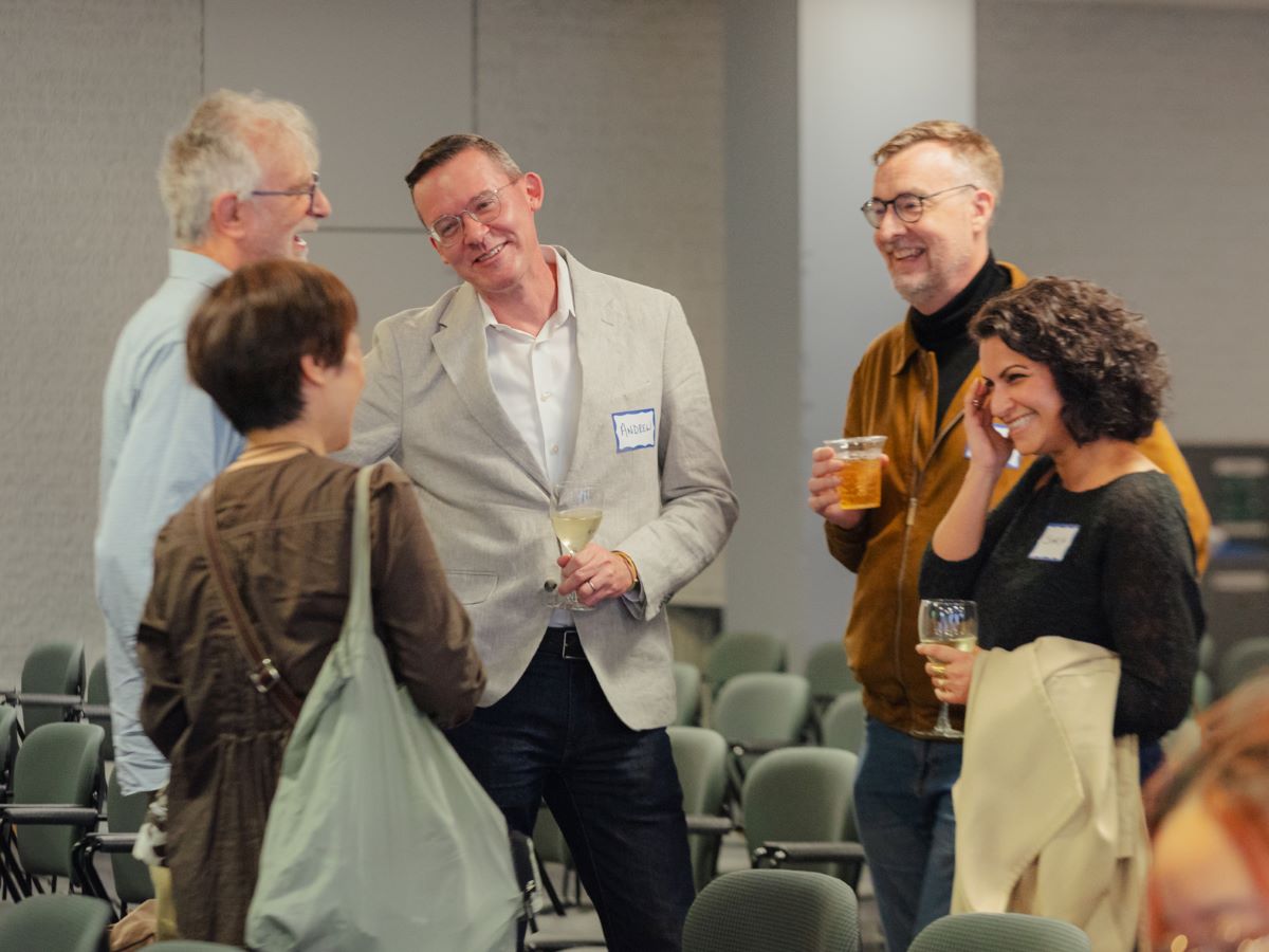 Faculty and alumni speaking