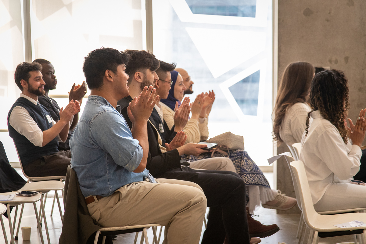 Audience applauding at 3MT