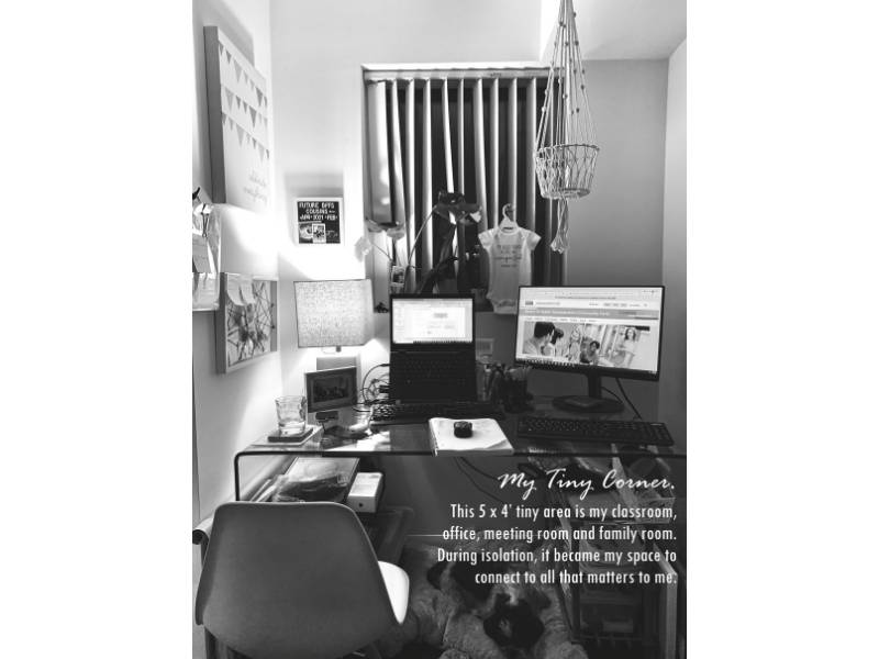A black-and-white image of a home office.