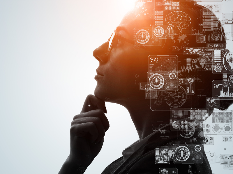 Woman in contemplative pose with AI graphics overlayed on top of image