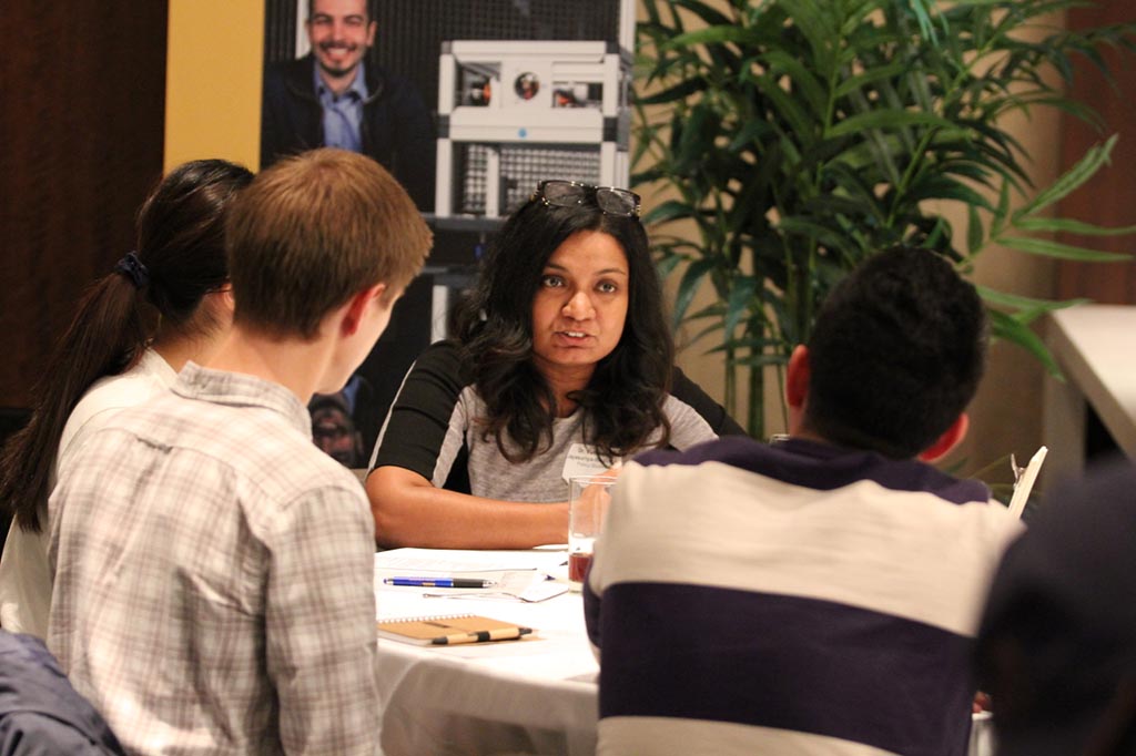 Vathsala Illesinghe talking with student participants