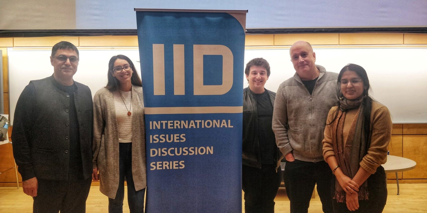 Guest speaker and IID committee at a previous event: Dr. Sanjay Rupelia, Aviva Gomes-Bhatt, Benn Bland, Dr. Arne Kislenko, and Vamika Jain.