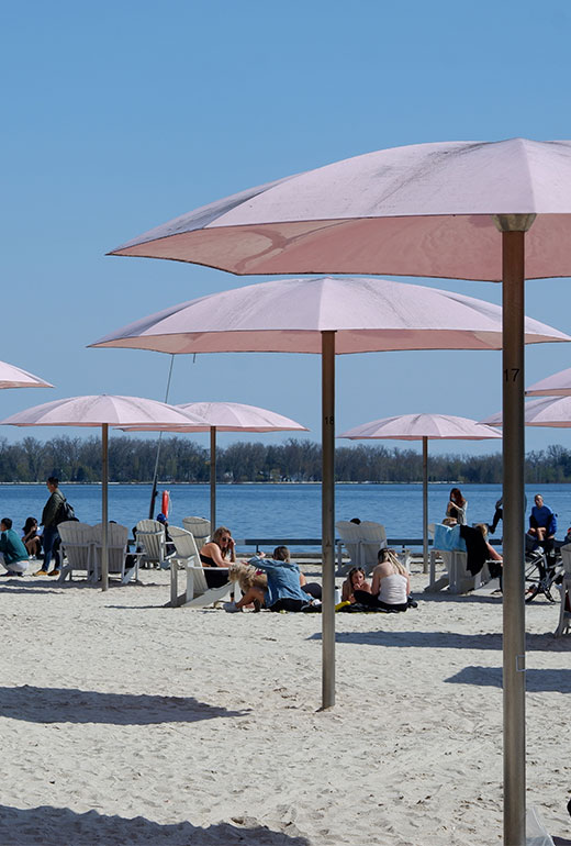 Pink umbrellas on Toronto's Sugar Beach Park
