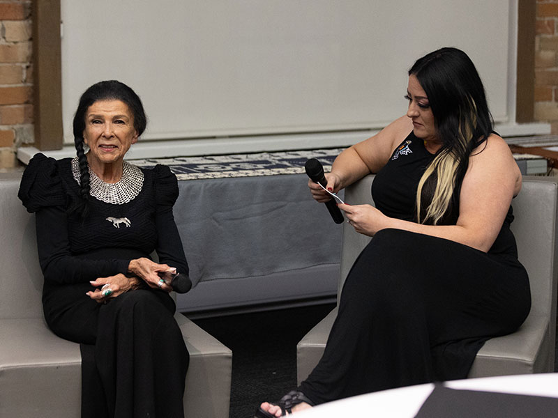 Alanis Obomsawin, film director, and Karina Brant, student and member of the Indigenous Education council, in conversation in front of an audience