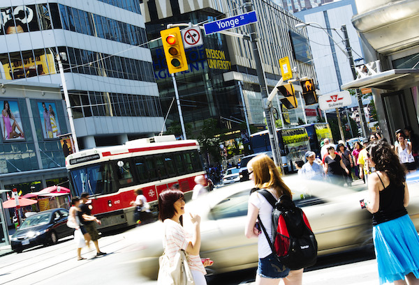 Intersection of Yonge and Dundas. Students are steps away from the financial distract and many companies.