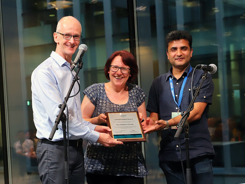 Three members from the Children’s Society and the Social Policy Research Unit receiving their award
