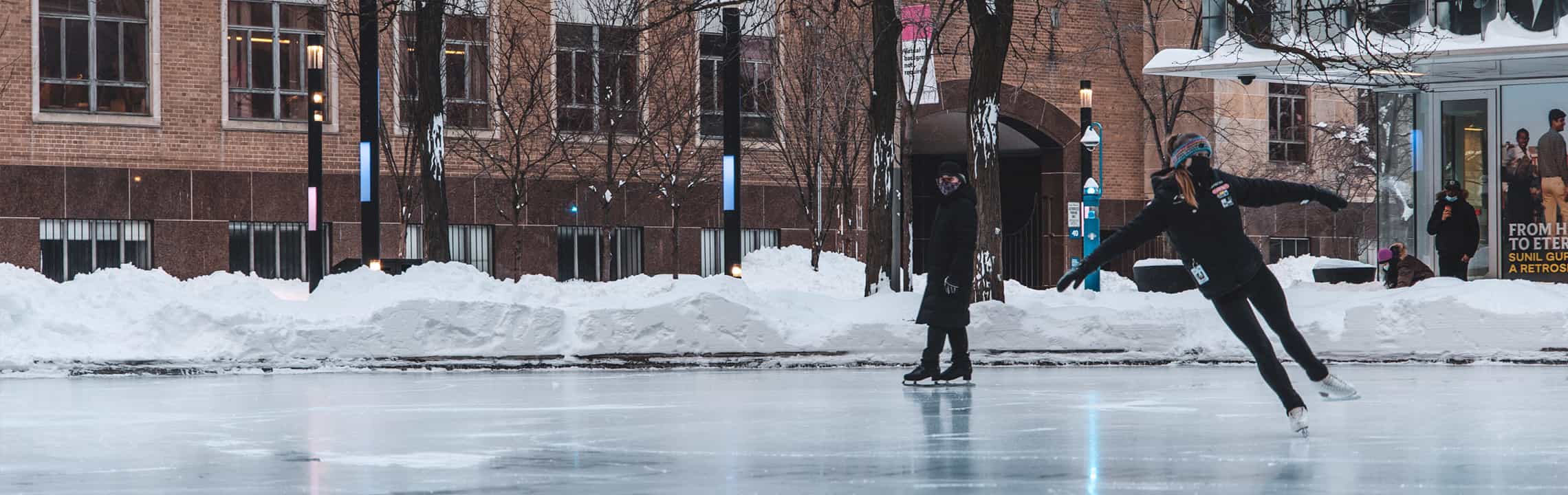Student ice skating at Lake Devo.