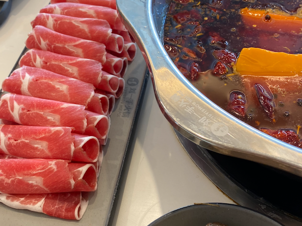 Lamb meat with hot chili beef oil soup at Liuyishou Restaurant