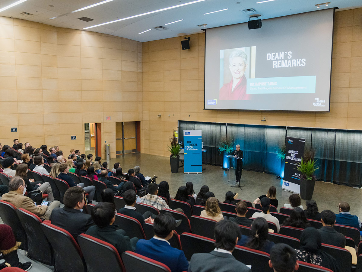 Daphne Taras at the podium