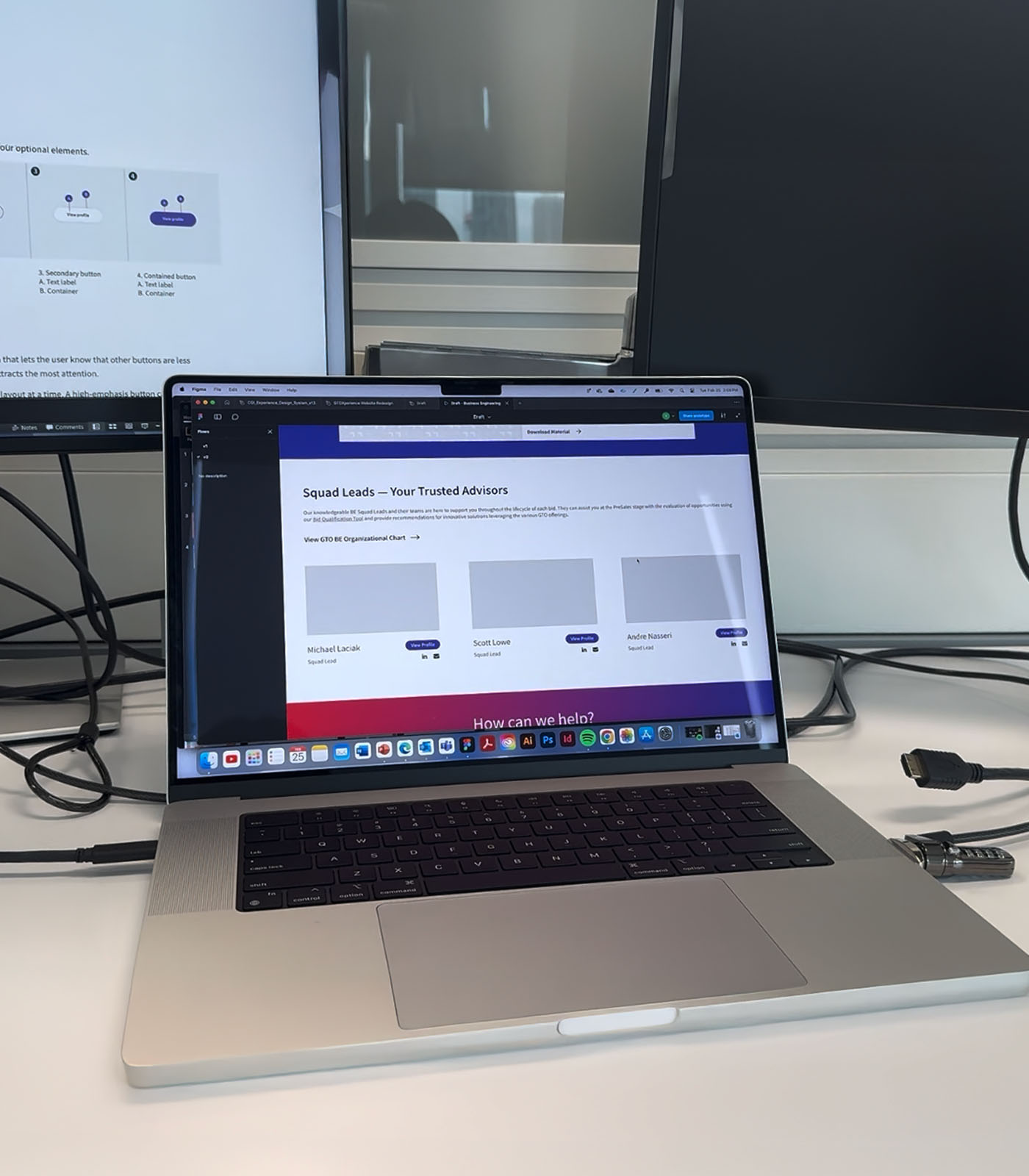 A laptop placed on a desk with office surroundings