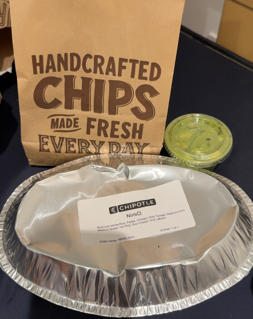 Chipotle bowl with chips and guacamole