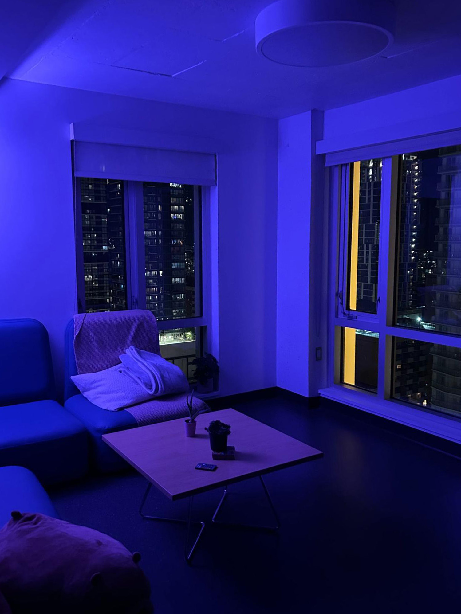 Livingroom illuminated with purple LED lighting