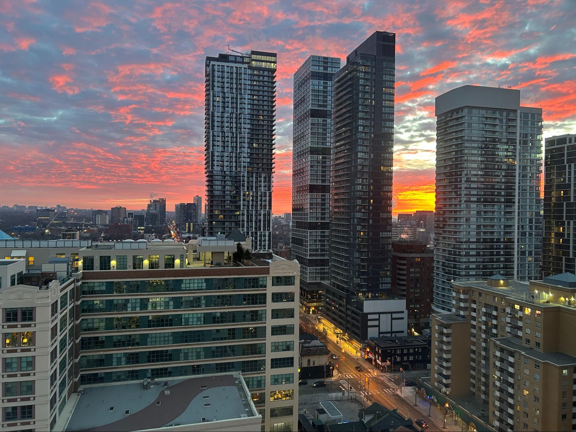 City skyline at sunset with high-rise buildings
