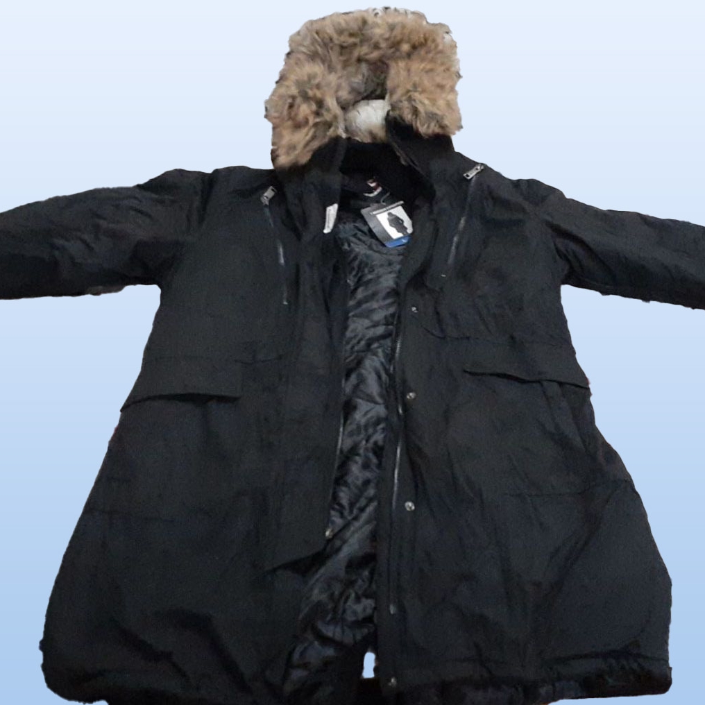 A black winter coat with a fur hood.
