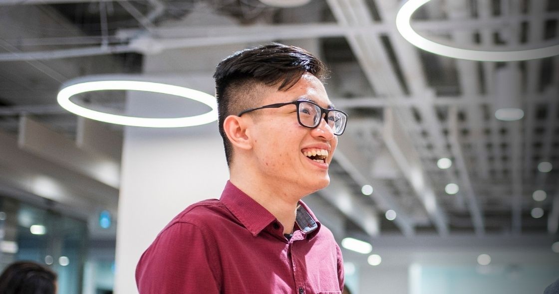 Student smiling in the English Language Insitute