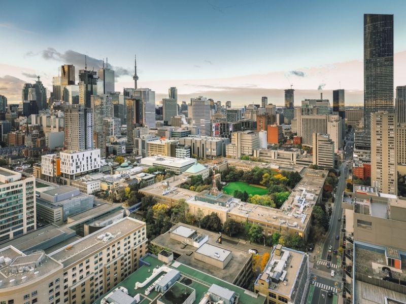 Ariel shot of the Toronto Metropolitan University quad and Toronto skyline.