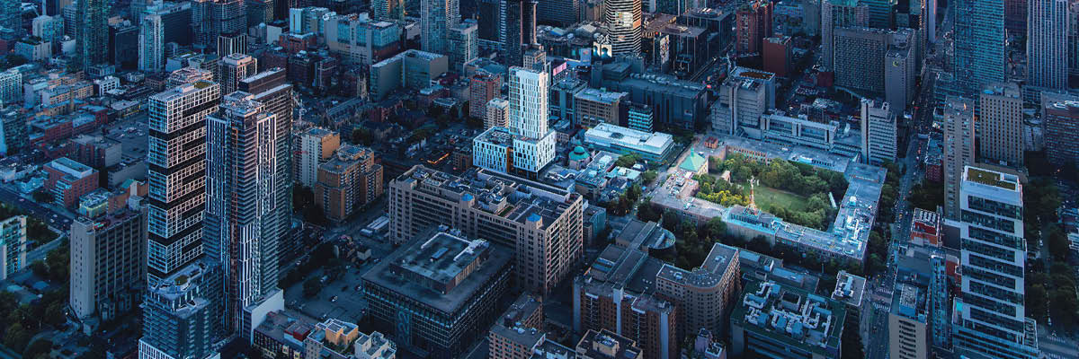 An aerial view of campus at sunset looking southwest.