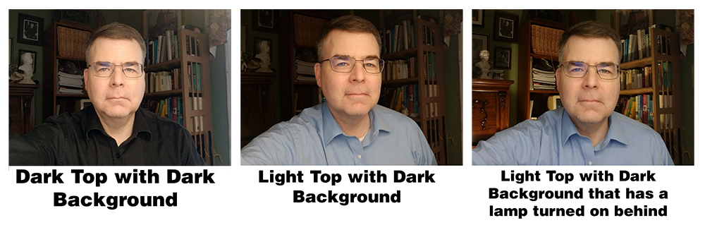 Photo of Gary Gould demonstrating the difference between wearing light and dark shirts.