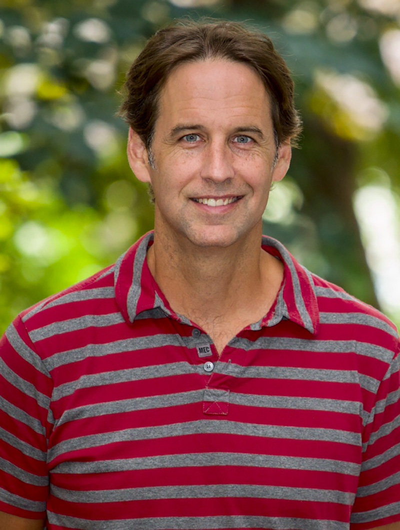 Head shot of Gavin Adamson.