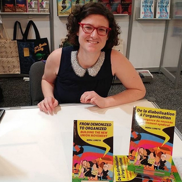 Alumna and author Nora Loreto at a pre-pandemic book signing. 
