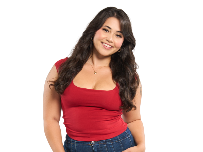 Headshot of Mercedes Gaztambide wearing a red top in front of a white background.