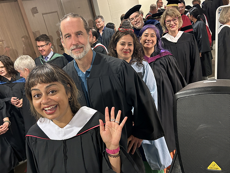 School of Journalism 2023 faculty and staff walk into the convocation ceremony.