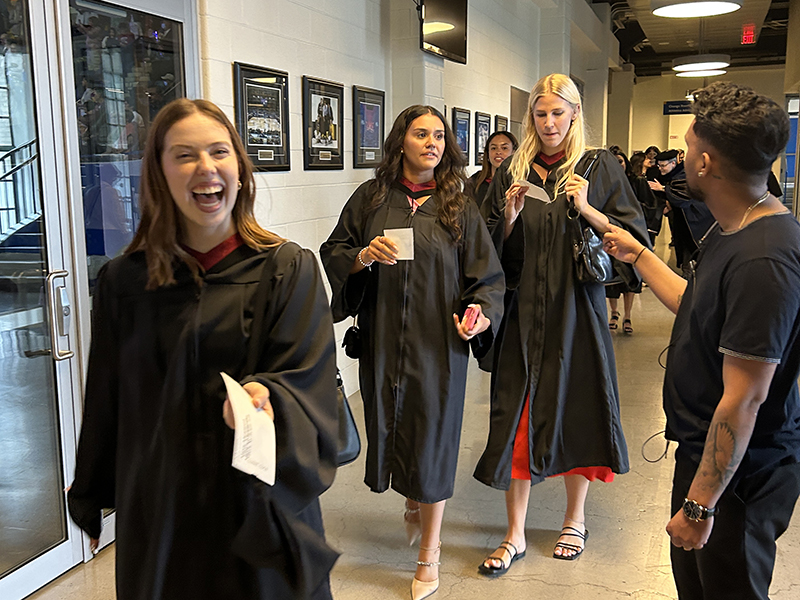 School of Journalism 2023 Master graduates walk into the convocation ceremony.