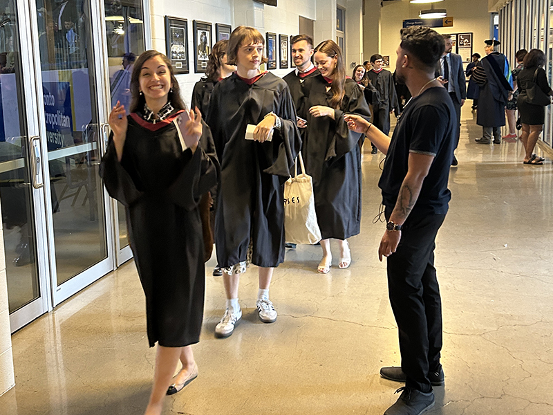 School of Journalism 2023 Master graduates walk into the convocation ceremony.