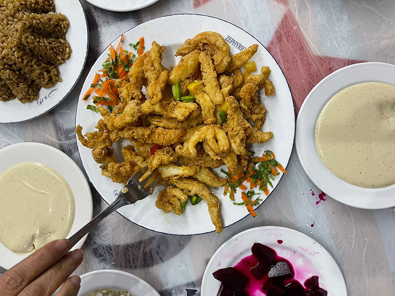 Many dishes of food