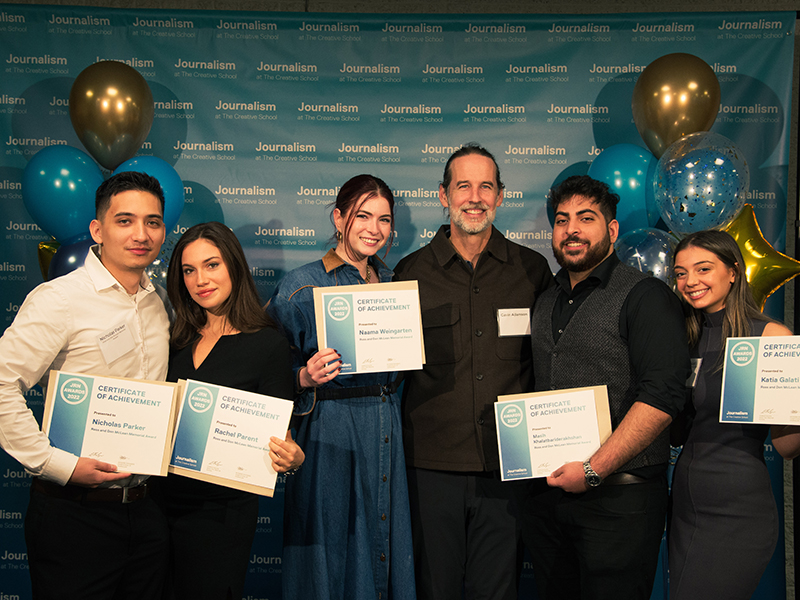 Five award winners stand with Gavin Adamson at Journalism school award ceremony.