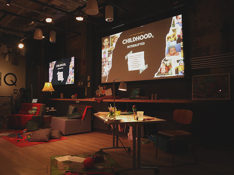 A performance room with two projections on the wall.