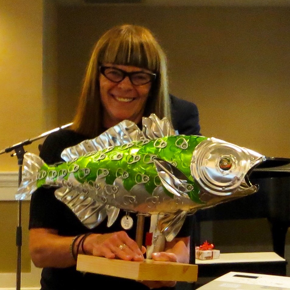 Photo of Christie Blatchford with a fish