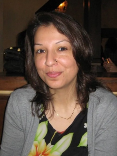 Headshot of Naheed Mustafa.