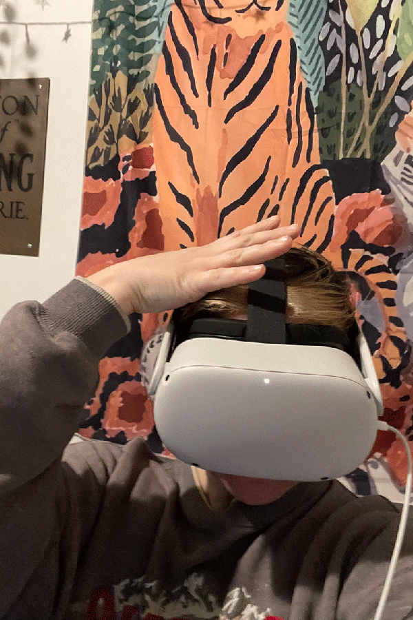 A woman wearing a VR headset