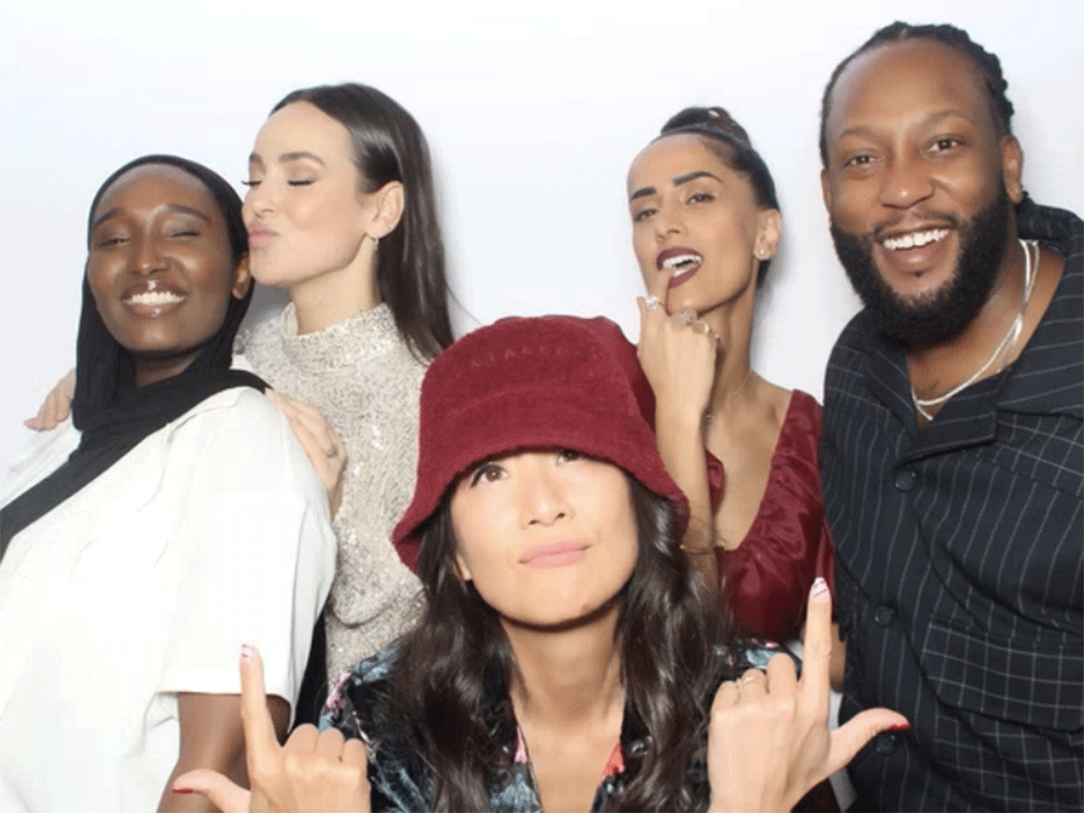 Kadjia taking a group photo with the etalk hosts