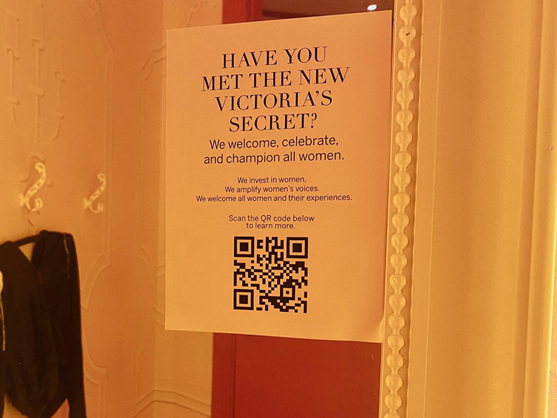 A sign advertising the rebrand hangs in Victoria’s Secret’s Square One fitting rooms 