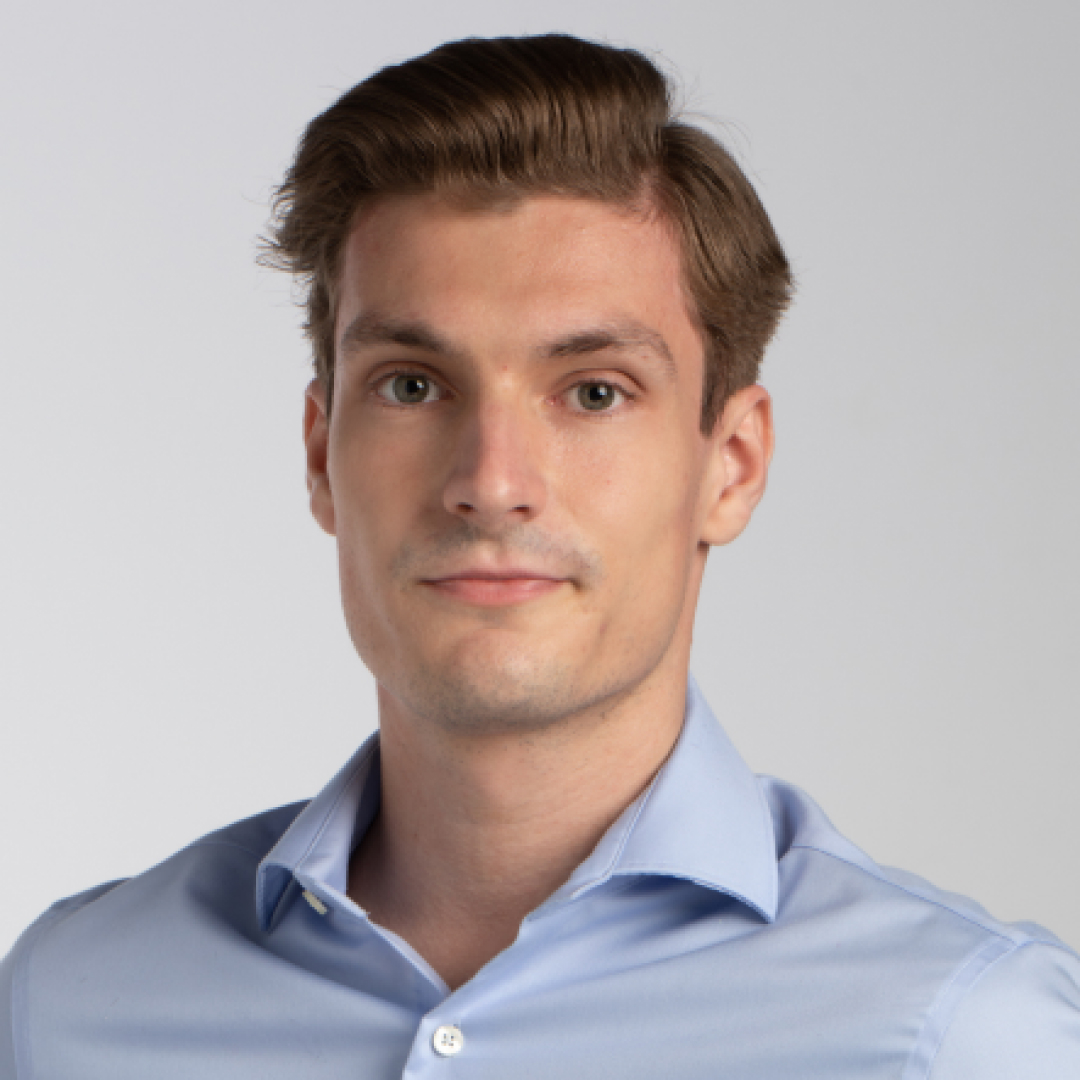 Headshot of Ben Shelley wearing business shirt