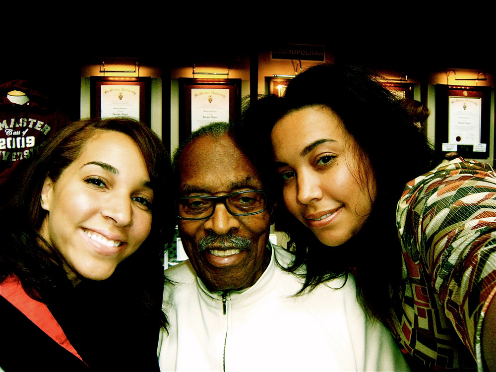 The Honourable Lincoln Alexander with two women