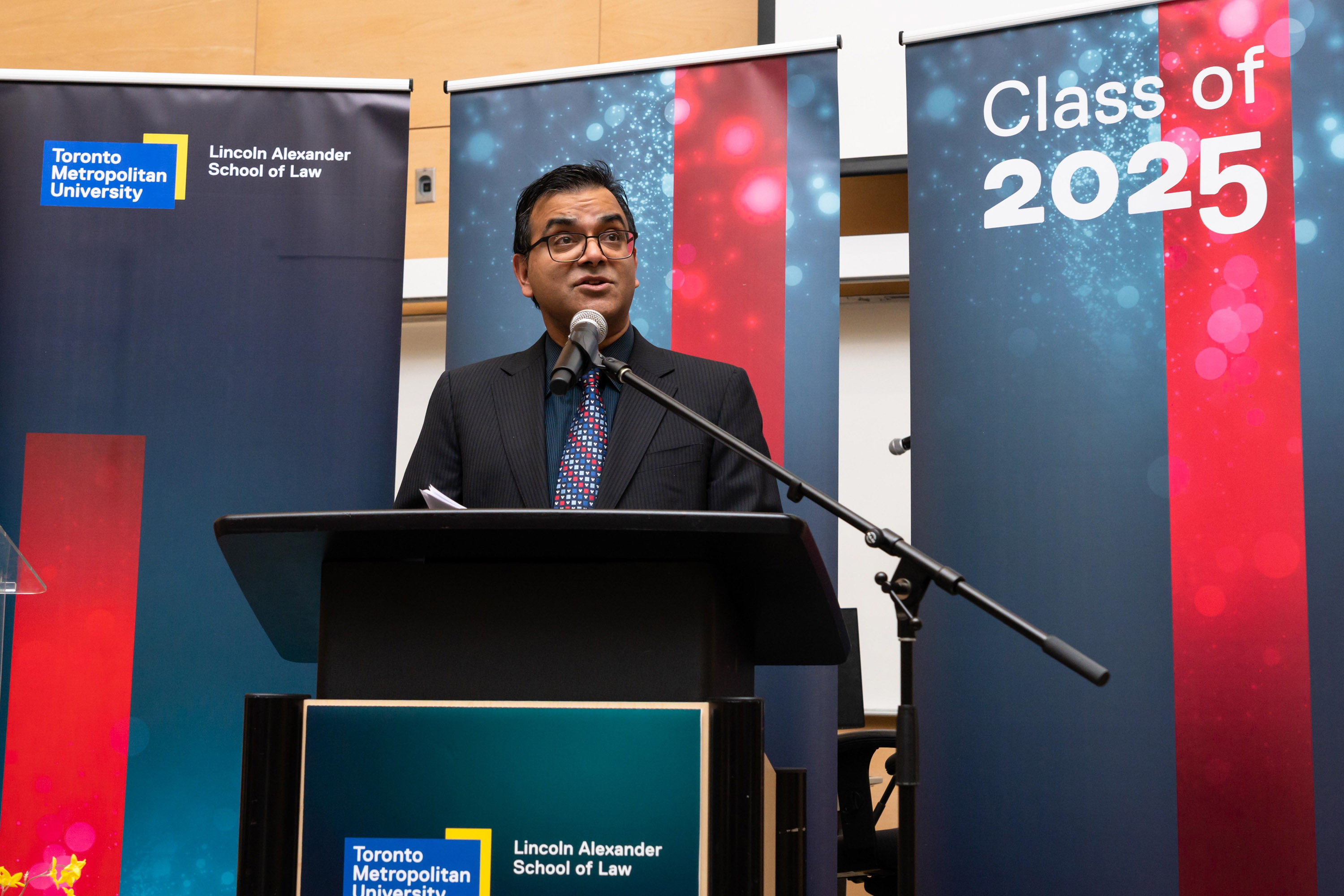 male speaker at the podium