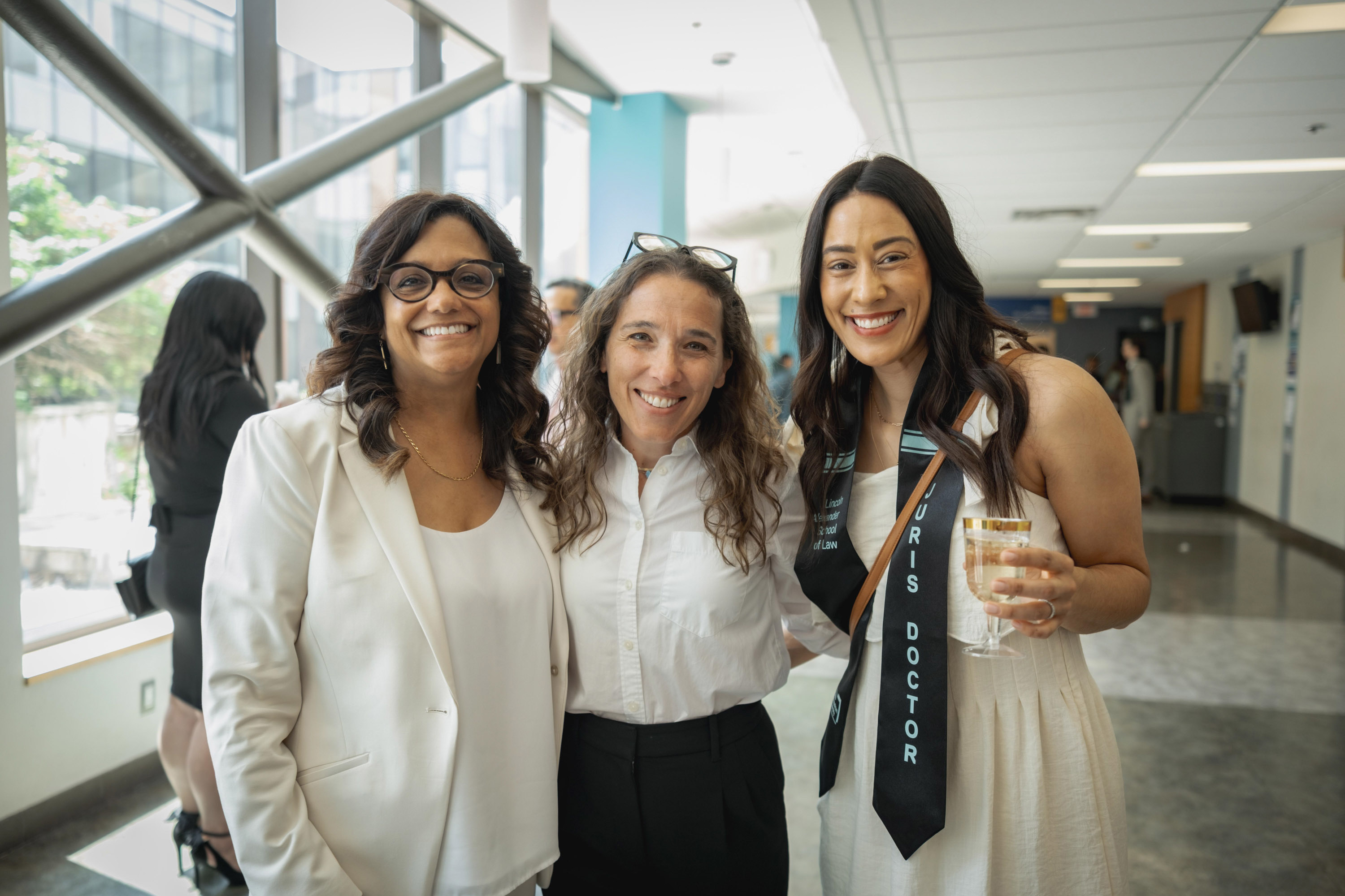 faculty and grad posing