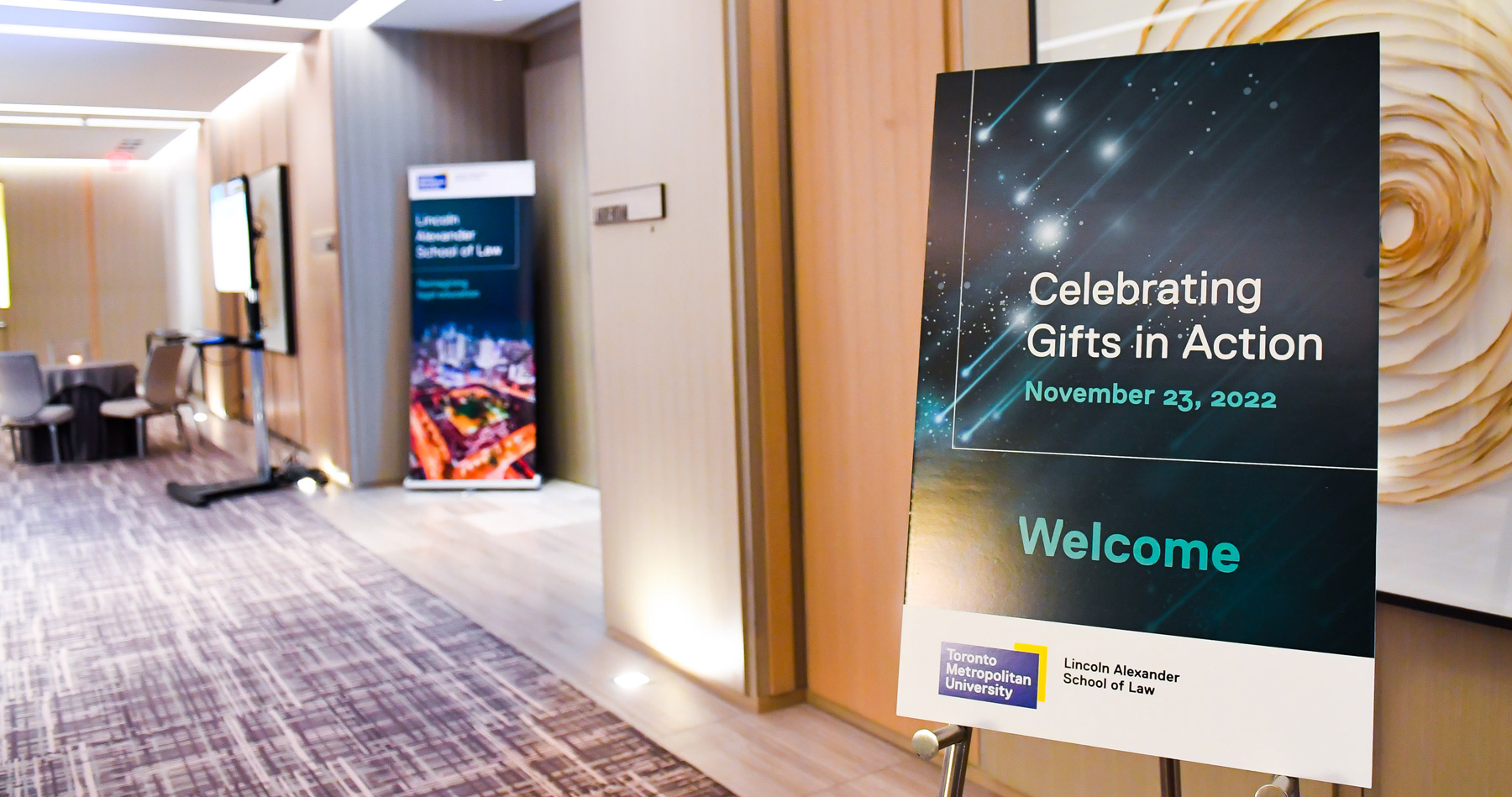 Celebrating Gifts in Action event signage