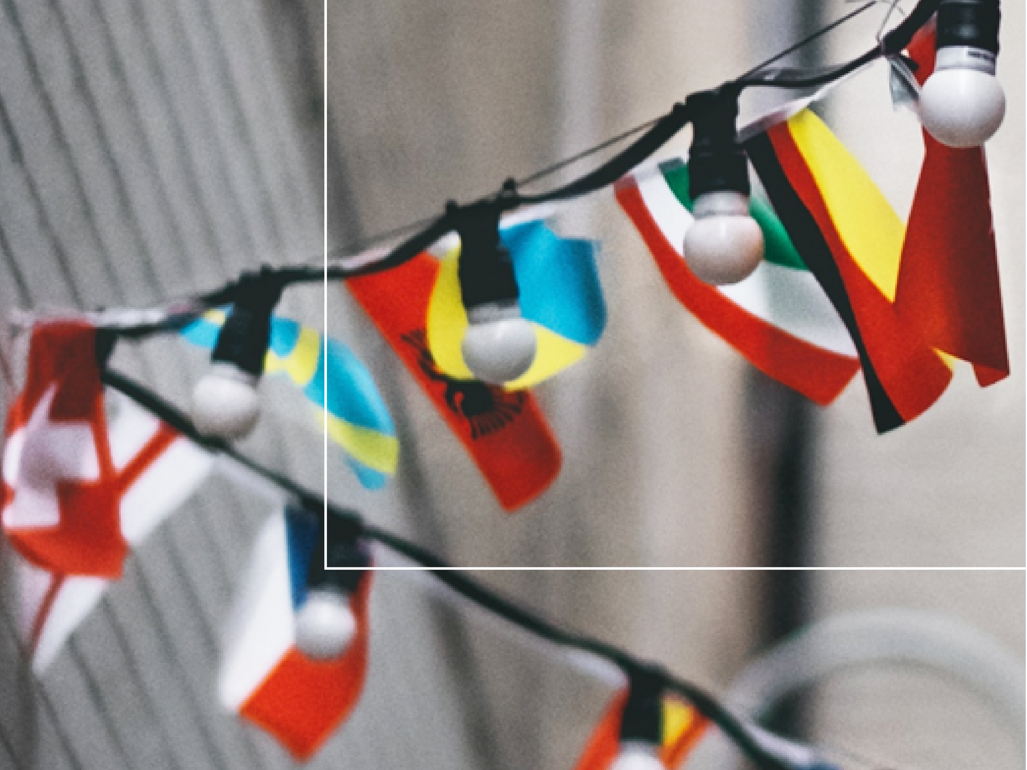 International flags and lamps hanging from above