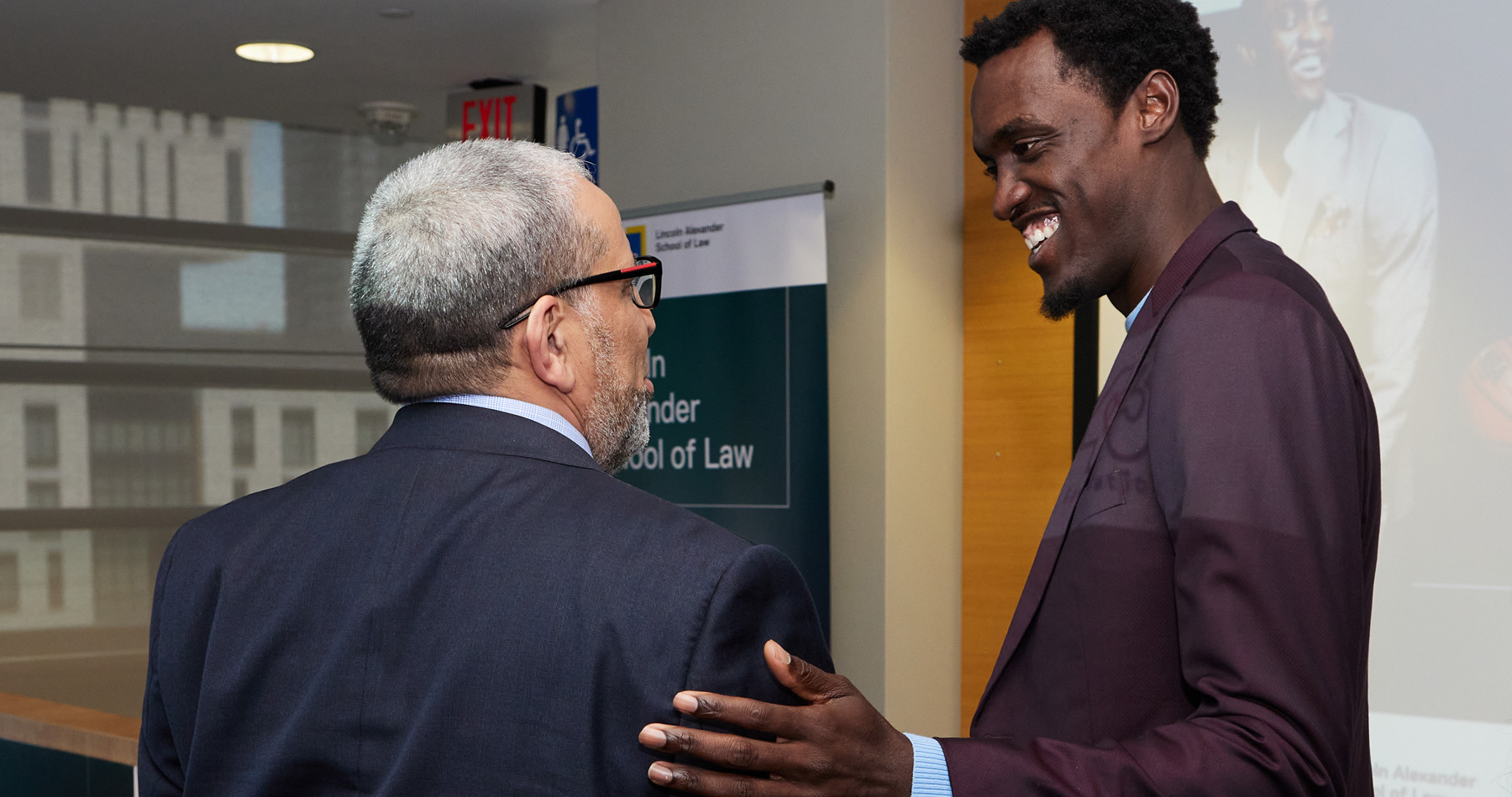 President Mohamed Lachemi and Pascal Siakam
