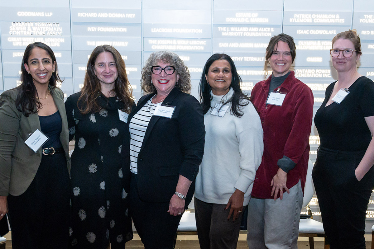panelists posing for a group photo