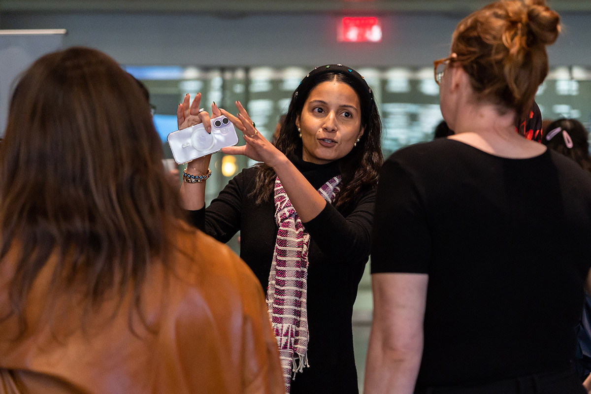 people gathered in conversation at fertility justice event