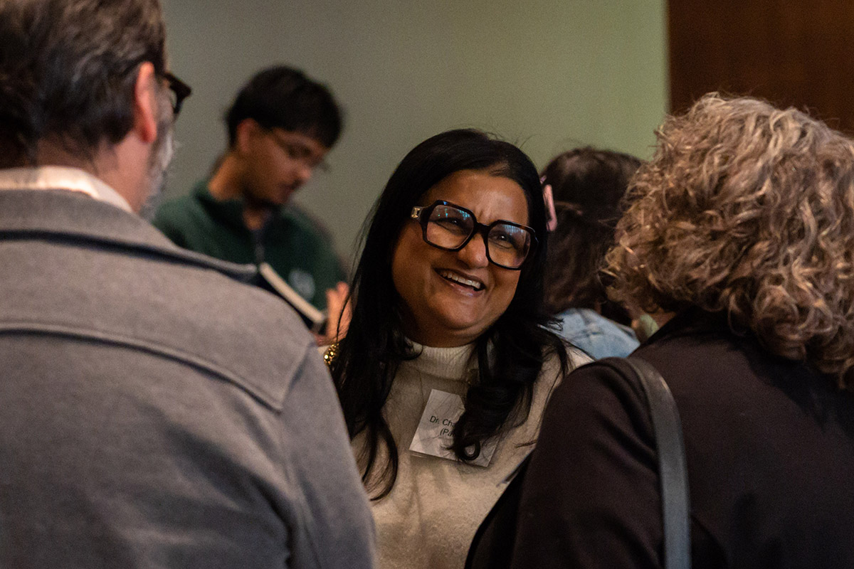 people gathered in conversation at fertility justice event
