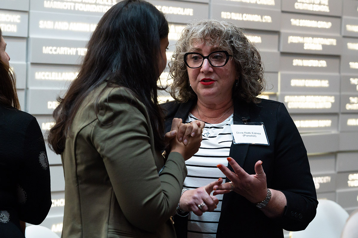 people gathered in conversation at fertility justice event