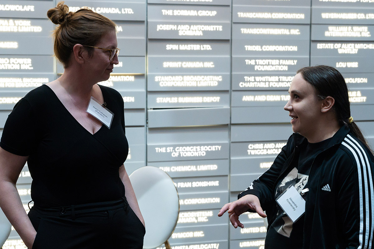 people gathered in conversation at fertility justice event