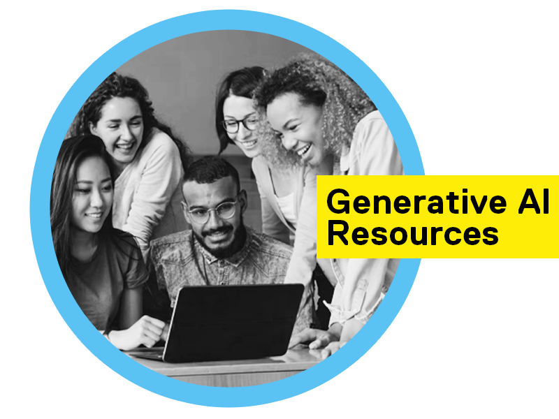 Students and instructor gathered around a laptop